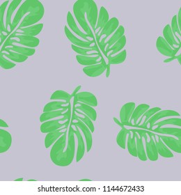 Tropical seamless pattern with leaves. Beautiful tropical isolated leaves. Fashionable summer background with leaves for fabric, wallpaper, paper, covers.