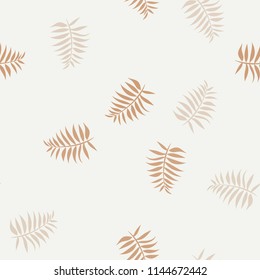 Tropical seamless pattern with leaves. Beautiful tropical isolated leaves. Fashionable summer background with leaves for fabric, wallpaper, paper, covers.