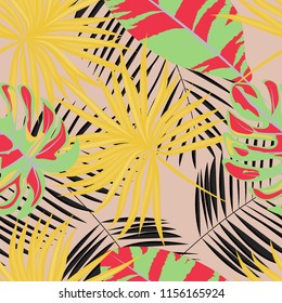 Tropical seamless pattern with leaves. Beautiful tropical isolated leaves. Fashionable summer background with leaves for fabric, wallpaper, paper, covers.