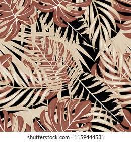 Tropical seamless pattern with leaves. Beautiful tropical isolated leaves. Fashionable summer background with leaves for fabric, wallpaper, paper, covers.