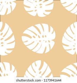 Tropical seamless pattern with leaves. Beautiful tropical isolated leaves. Fashionable summer background with leaves for fabric, wallpaper, paper, covers.