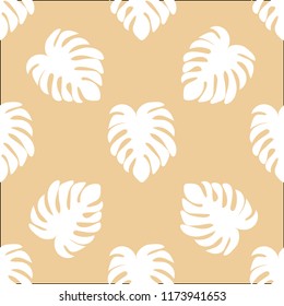 Tropical seamless pattern with leaves. Beautiful tropical isolated leaves. Fashionable summer background with leaves for fabric, wallpaper, paper, covers.