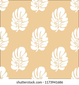 Tropical seamless pattern with leaves. Beautiful tropical isolated leaves. Fashionable summer background with leaves for fabric, wallpaper, paper, covers.