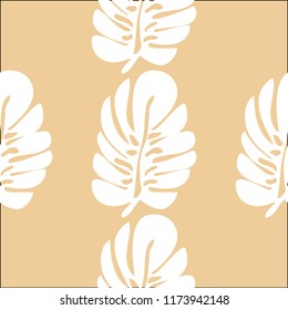 Tropical seamless pattern with leaves. Beautiful tropical isolated leaves. Fashionable summer background with leaves for fabric, wallpaper, paper, covers.