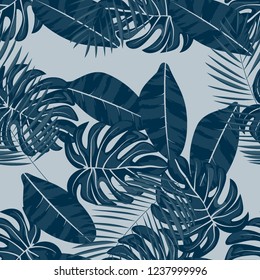 Tropical seamless pattern with leaves. Fashionable summer background with leaves for fabric, wallpaper, paper, covers.Background of tropical leaves.