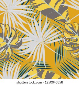 Tropical seamless pattern with leaves.Exotic tropical isolated leaves. Fashionable summer background with leaves for fabric, wallpaper, paper, covers.