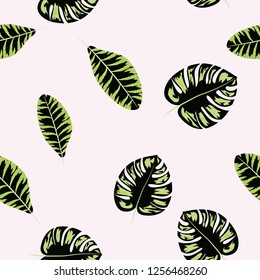 Tropical seamless pattern with leaves.Exotic tropical isolated leaves. Fashionable summer background with leaves for fabric, wallpaper, paper, covers.