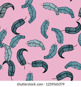 Tropical seamless pattern with leaves.Exotic tropical isolated leaves. Fashionable summer background with leaves for fabric, wallpaper, paper, covers.