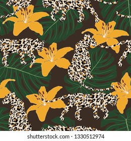 Tropical seamless pattern. Monstera leaves, blossom yellow lily flowers and leopard skin silhouette. Exotic modern repeat vector illustration. Creative print on green background. Fashion, fabric, tile
