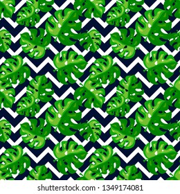 Tropical seamless pattern. Monstera leaves and chevron background. Vector illustration.