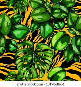 Tropical seamless pattern on animalistic texture. Jungle exotic summer print. Summer tropical leaf. Tropical flower fashion pattern. Floral tropic illustration. Vector seamless pattern.