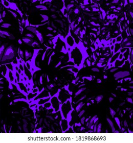 Tropical seamless pattern on animalistic texture. Jungle exotic summer print. Summer tropical leaf. Tropical flower fashion pattern. Floral tropic illustration. Vector seamless pattern.