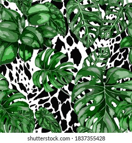 Tropical seamless pattern on animalistic texture. Jungle exotic summer print. Summer tropical leaf. Tropical flower fashion pattern. Floral tropic illustration. Vector seamless pattern.