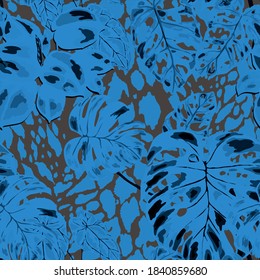Tropical seamless pattern on animalistic texture. Jungle exotic summer print. Summer tropical leaf. Tropical flower fashion pattern. Floral tropic illustration. Vector seamless pattern.	