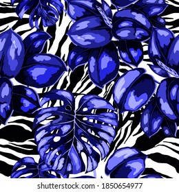 Tropical seamless pattern on animalistic texture. Jungle exotic summer print. Summer tropical leaf. Tropical flower fashion pattern. Floral tropic illustration. Vector seamless pattern.	
