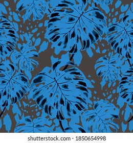 Tropical seamless pattern on animalistic texture. Jungle exotic summer print. Summer tropical leaf. Tropical flower fashion pattern. Floral tropic illustration. Vector seamless pattern.	