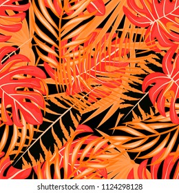 Tropical seamless pattern with orange leaves. Beautiful tropical isolated leaves. Fashionable summer background with orange leaves for fabric, wallpaper, paper, cover.