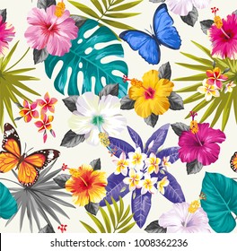 Tropical seamless pattern with palm leaves and exotic flowers. Vector illustration.