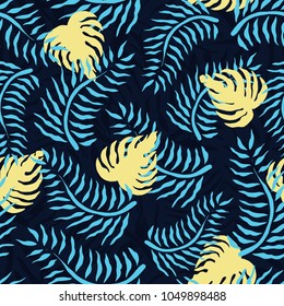 Tropical seamless pattern with palm leaves. Summer floral pattern with green palm foliage and yellow monstera on dark background. Cool seamless pattern for textile industry. Vector