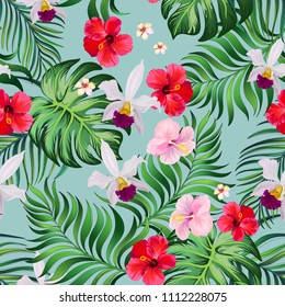 Tropical seamless pattern with palm leaves, hibiscus flwers and orchid. Vector jungle background.