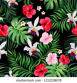 Tropical seamless pattern with palm leaves, hibiscus flwers and orchid. Vector jungle background.