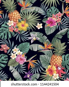 Tropical seamless pattern with palm leaves and exotic flowers. Vector illustration.