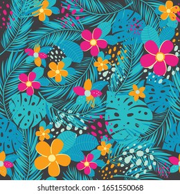 Tropical seamless pattern with palm leaves and flowers. Vector illustration.