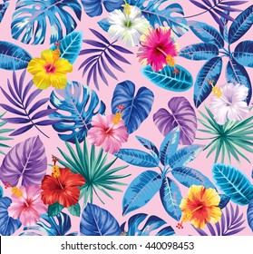 Tropical seamless pattern with palm leaves and flowers. Vector illustration.