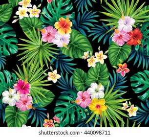 Tropical seamless pattern with palm leaves and flowers. Vector illustration.