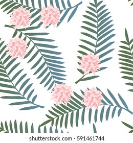 Tropical seamless pattern with palm leaves and flowers. Trendy colors for textile or book covers, manufacturing, wallpapers, print, gift wrap and scrapbooking. 