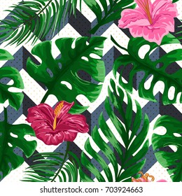 Tropical seamless pattern with palm leaves and pink flowers on triangle blue and white background with golden transparent dots. Vector hand drawn detailed illustration.