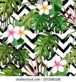 Tropical seamless pattern. Palm tree leaves and flower. Hand drawn vector illustration. Summer background. Watercolor style