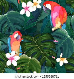 Tropical seamless pattern. Palm tree leave, flower hibiscus and parrot. Hand drawn vector illustration. Summer background