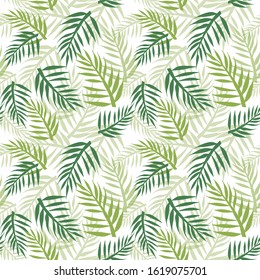 Tropical seamless pattern with palm tree leaves. Endless texture with beautiful palm leaf silhouette on a white background. 