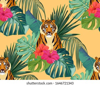 Tropical seamless pattern. Palm tree leaves, flower hibiscus and tiger. Vector illustration. Summer background 