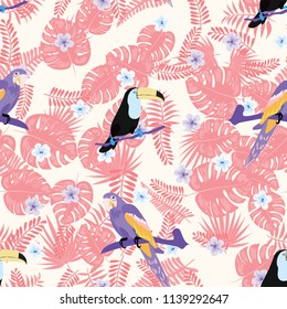 Tropical seamless pattern with a parrot, toucan and tropical flowers and leaves.