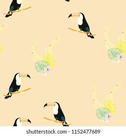 Tropical seamless pattern with a parrot, toucan and tropical flowers and leaves.