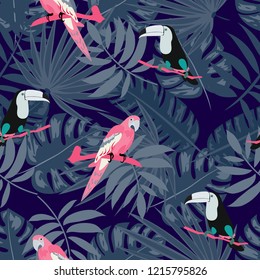 Tropical seamless pattern with a parrot, toucan and tropical flowers and leaves.