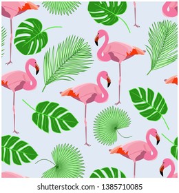 Tropical seamless pattern with pink flamingos and palms leaves. Vector illustration