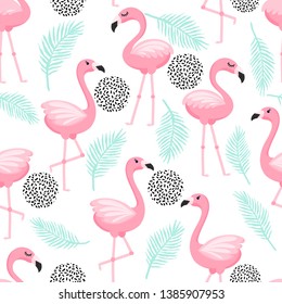 Tropical seamless pattern with pink flamingos,and palm leaves on background. Design for fabric, wallpaper, textile and decor