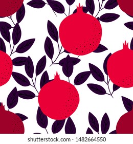 Tropical seamless pattern with red pomegranates. Vector bright print for fabric or wallpaper.
