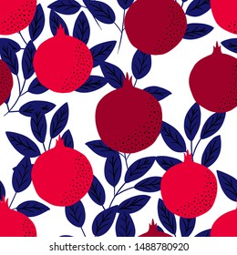 Tropical seamless pattern with red pomegranates. Vector bright print for fabric or wallpaper.