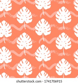 Tropical seamless pattern with silhouettes of monstera leaf on orange background. Vector illustration of summer. Exotic wallpaper. For web, banners, scrapbooking, printing on fabric, wrapping paper.