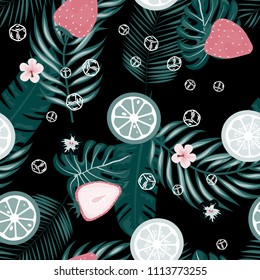 Tropical seamless pattern with strawberries, lemon, lime and tropical leaves. Bright fruit pattern with tropics. Background with fruits.