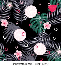 Tropical seamless pattern with strawberries, lemon, lime and tropical leaves. Bright fruit pattern with tropics. Background with fruits.