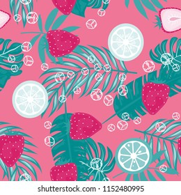 Tropical seamless pattern with strawberries, lemon, lime and tropical leaves. Bright fruit pattern with tropics. Background with fruits.
