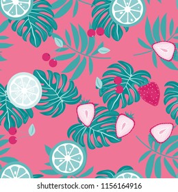 Tropical seamless pattern with strawberries, lemon, lime and tropical leaves. Bright fruit pattern with tropics. Background with fruits.