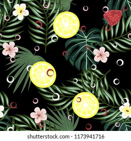 Tropical seamless pattern with strawberries, lemon, lime and tropical leaves. Bright fruit pattern with tropics. Background with fruits.