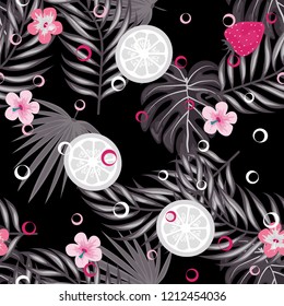 Tropical seamless pattern with strawberries, lemon, lime and tropical leaves. Bright fruit pattern with tropics. Background with fruits.
