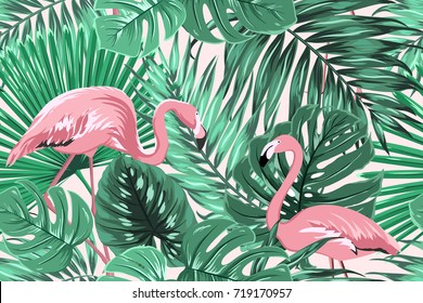 Tropical seamless pattern texture with exotic green palm jungle tree monstera leaves and pink flamingo birds couple. Vector design illustration for background, decoration, fashion, fabric, textile.